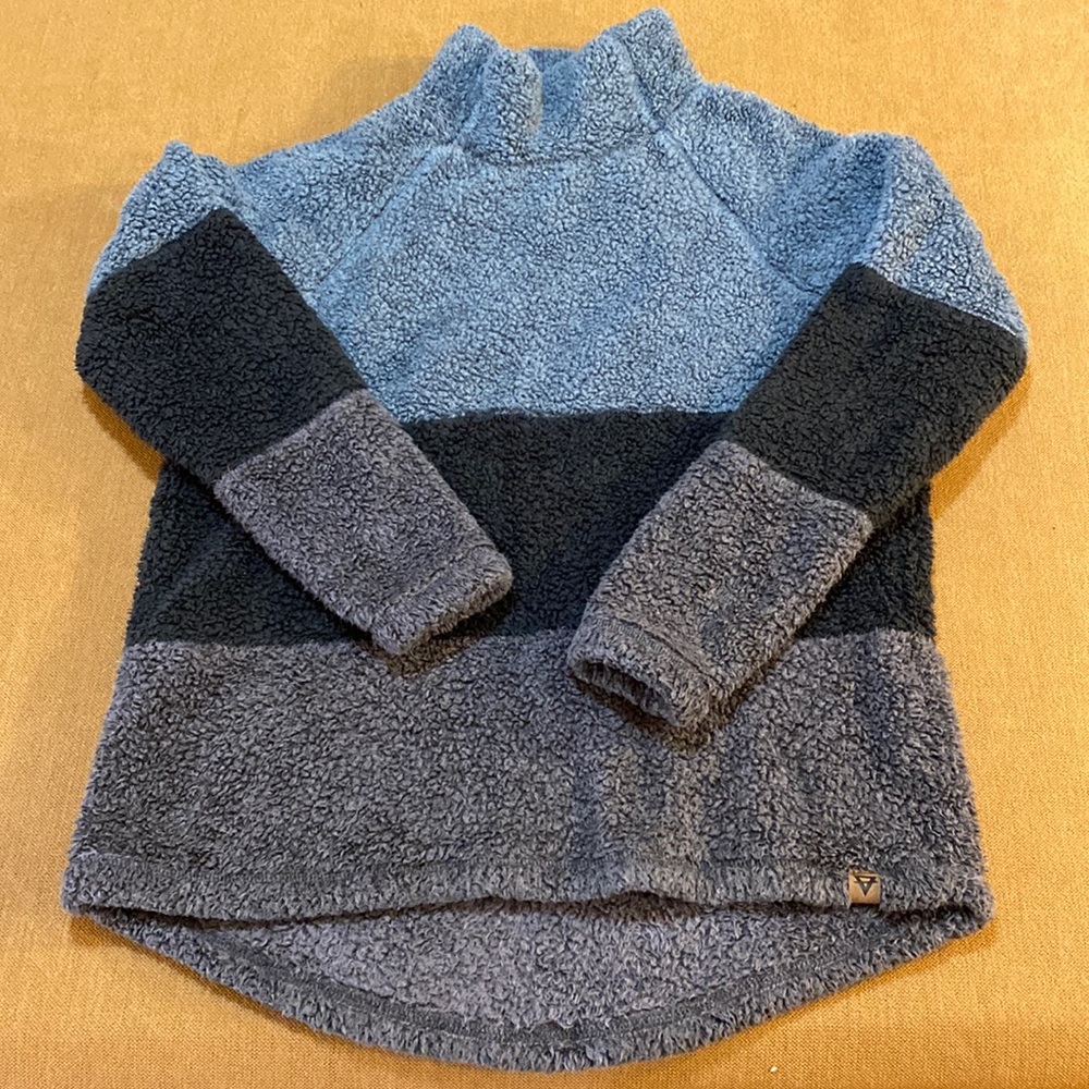 Large color block fleece pullover. Blue-gray, dark gray, and purple gray.